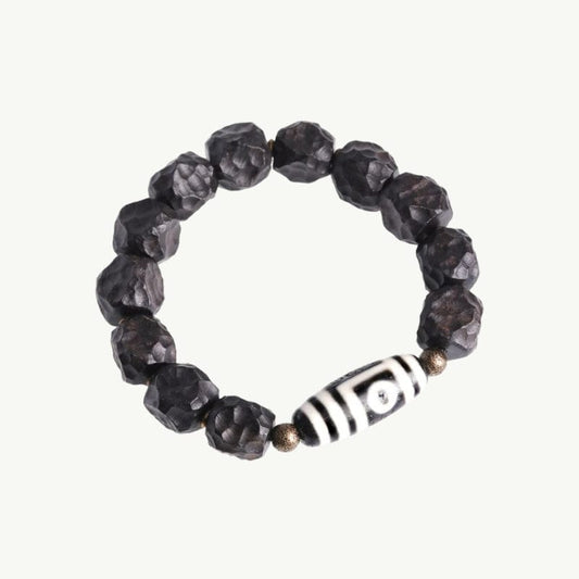 Amitabha - Bracelet en ébène sculpté et perle Dzi 15 à 16cm / Double Yeux