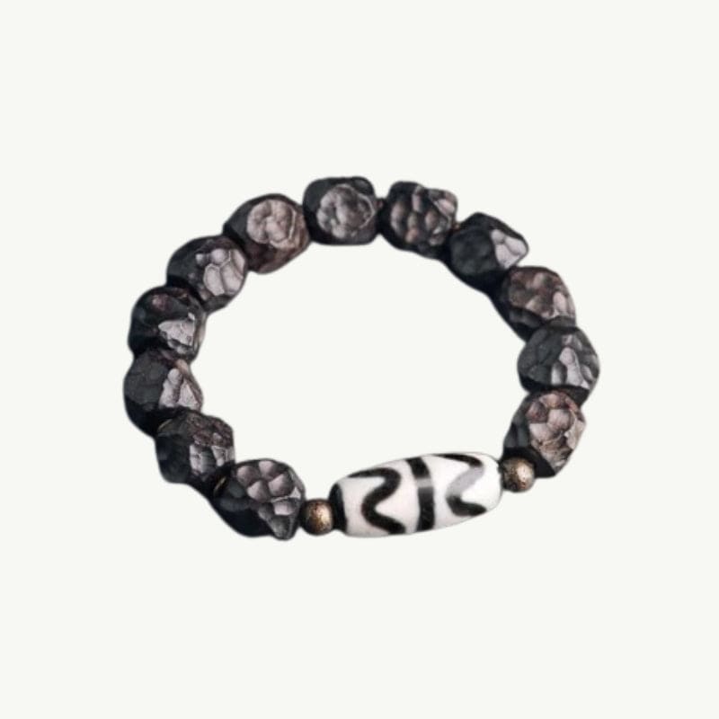 Amitabha - Bracelet en ébène sculpté et perle Dzi 17 à 18cm / Dents de Tigre