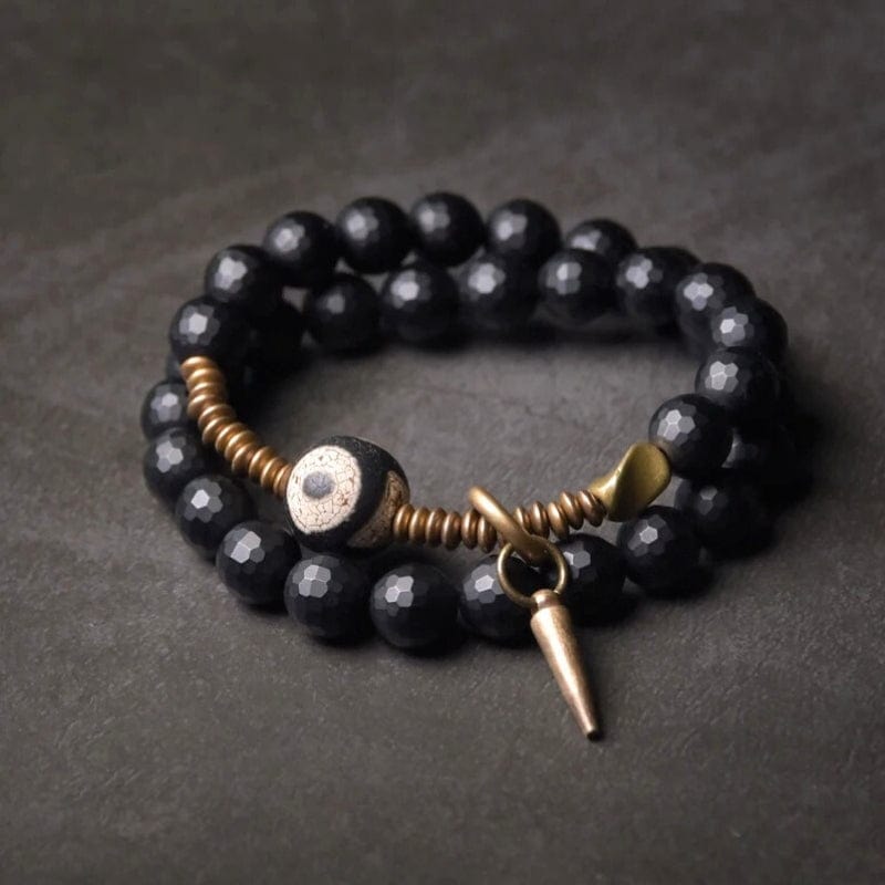 Kalachakra - Bracelet en onyx facetté, perle dzi et cuivre tibétain